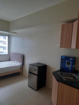 Avida Sola Studio unit Furnished with bed  refrigerator cabinet a