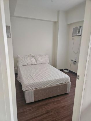 Furnished  1BR condo with free Wi Fi for rent near Ateneo  UP  MR