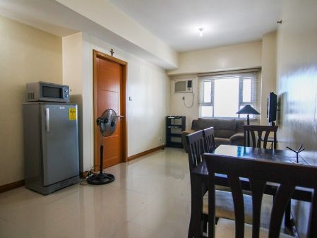 Fully Furnished 1 Bedroom Unit at Trion Towers for Rent