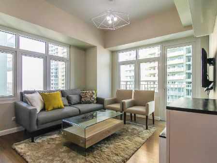 Fully Furnished Two Bedroom unit with parking in Two Serendra Mer