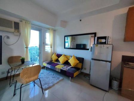Fully Furnished 1BR unit with balcony in The Trion Towers