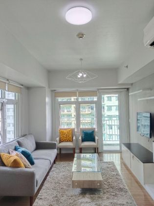 Furnished 2BR Unit with Balcony Parking for Rent at Two Serendra 