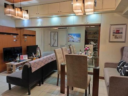 Furnished 2BR Unit facing the Amenities with Parking Slot