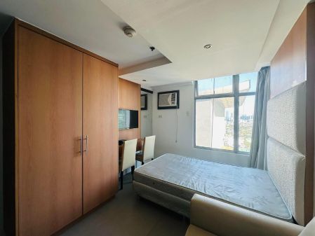 Semi Furnished Studio Unit at The Serenity Suites for Rent