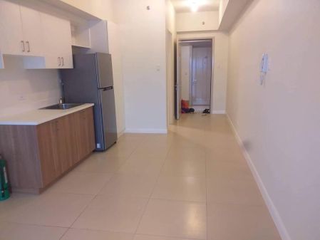 Semi Furnished Studio Unit in The Vantage by Rockwell