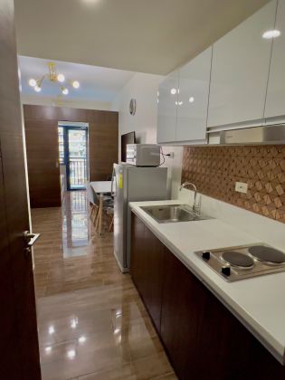 New Air Residences Condo 1 BR Fully Furnished  Facing the Pool