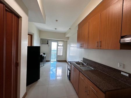 1BR Balcony Trion Towers Semi Furnished for Rent