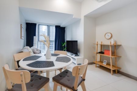 Fully Furnished 2 Bedroom Unit at Uptown Parksuites for Rent