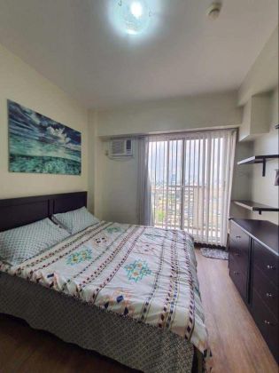 Fully Furnished 2 Bedroom Unit at Zinnia Towers for Rent
