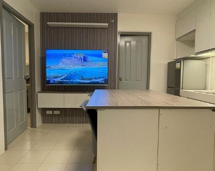 Condo 2 Bedroom in Karuhatan with pool, gym, basketbal court
