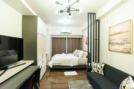 Interior Design Studio Unit in Air Residences Makati for Rent