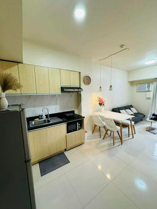 Fully Furnished Unit across Uptown Mall