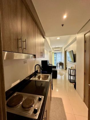 1BR Unit at Fame Residences Tower 1 with Pool View