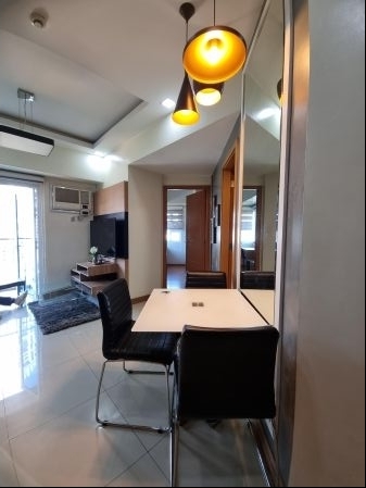 1BR Fully Furnished with Balcony at Trion Towers Taguig 