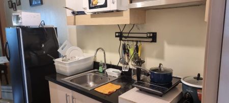 Studio with Internet and Queen Bed in SM Grass Residences