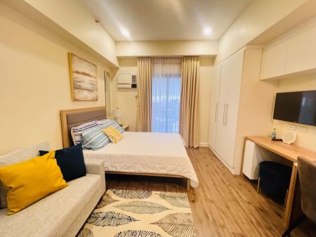 Nicely Furnished Studio with Balcony at Grand Residences Cebu