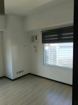 Semi Furnished 2 Bedroom Unit at Trion Towers for Rent