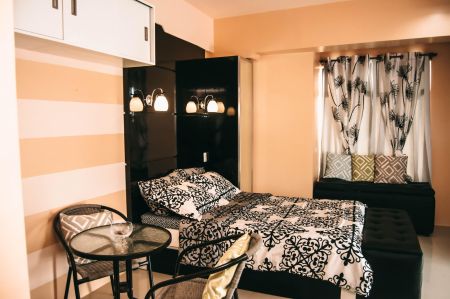 Studio Unit with Balcony plus Cable Phone TV Fibr Optic Internet