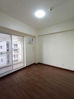 PRISMA05XXC: For Rent Semi Furnished 2BR Unit with Balcony and Pa