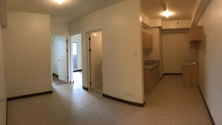 2BR Unit on Low Floor and View of Amenities at Brixton Place