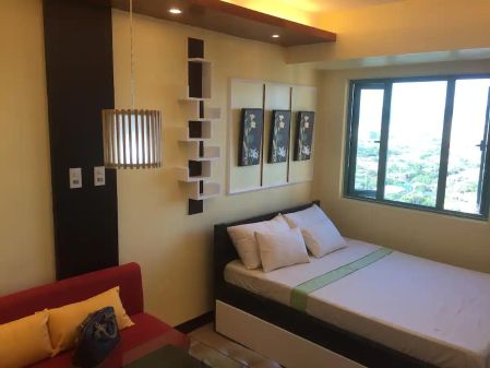 Fully Furnished Studio Unit at the top floor of the building. Fac