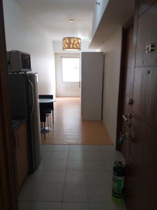 Furnished studio in One Archers place along Taft near DLSU